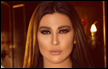 الممثلة اللبنانية نادين الراسي تطل بفستان أسود