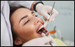 حكم علاج طبيبة الأسنان للرجال