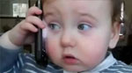 طفل يتحدث بالهاتف، تفهمون ما يقول؟